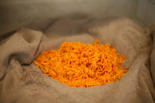 Drying shredded carrots.