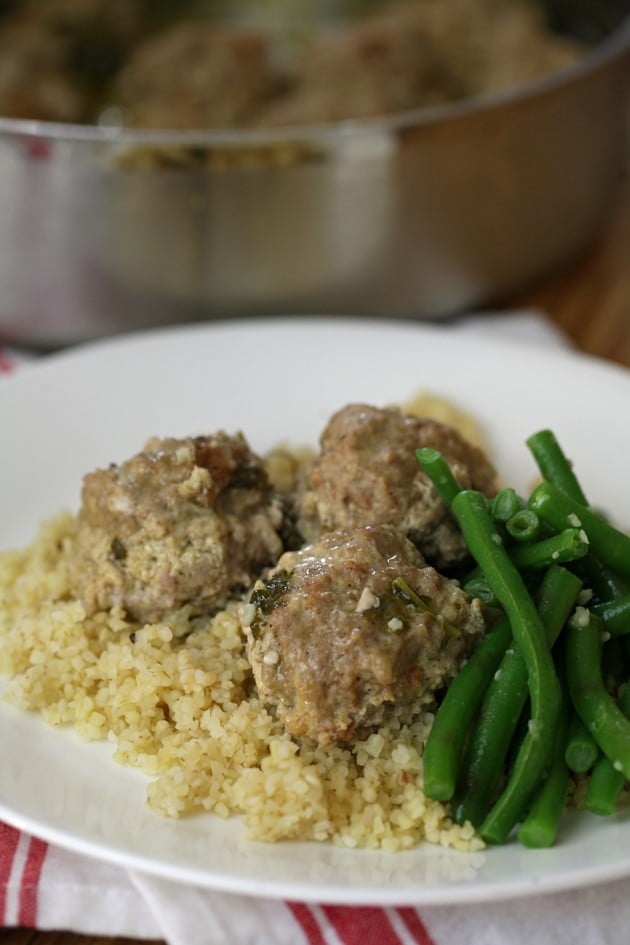 This is an easy turkey or chicken meatball recipe in cilantro, lemon, and garlic sauce. Serve over rice, quinoa, or bulgur.