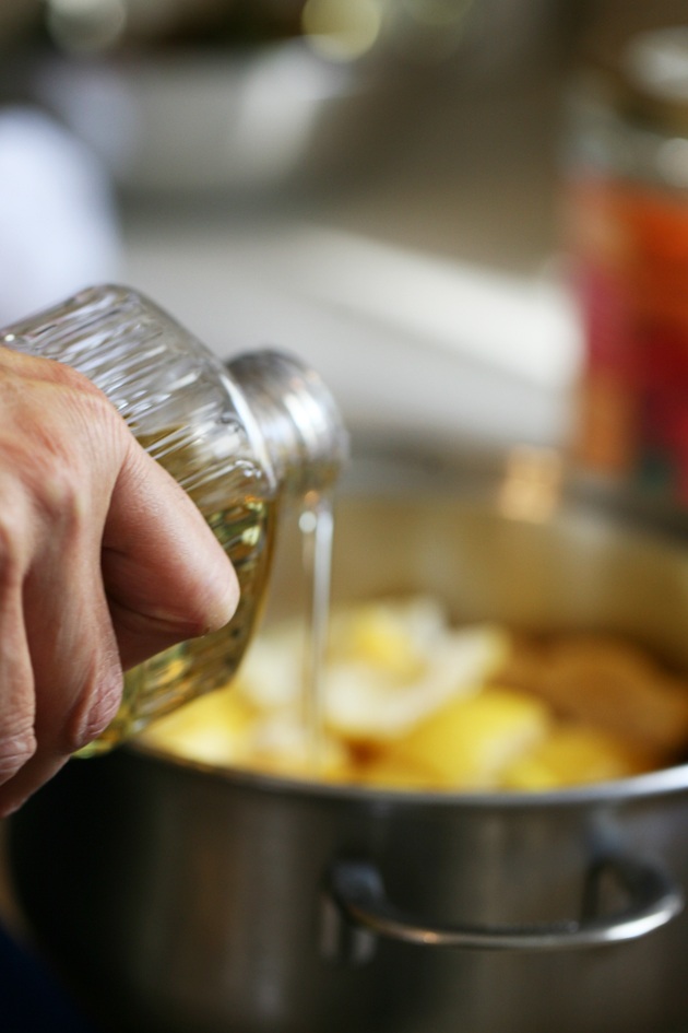Adding oil to lemon peel. 