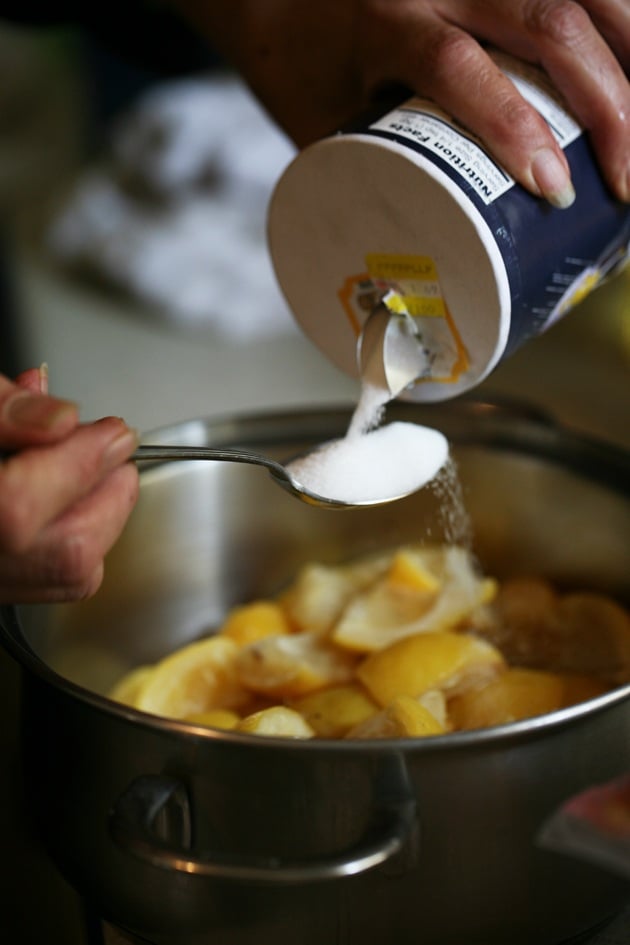 Adding salt to lemon peel. 