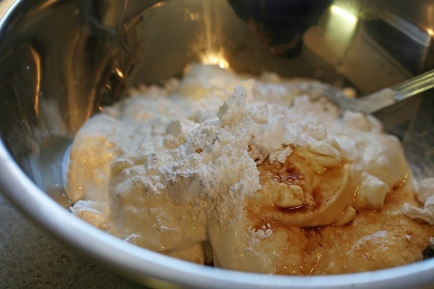 Mixing the sour cream topping.