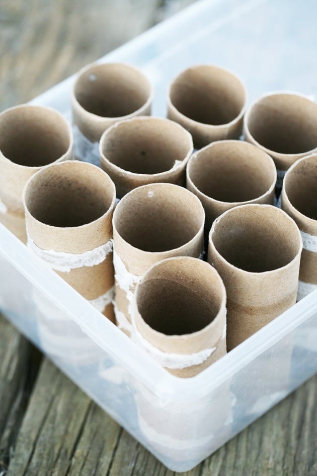 Organizing the rolls in a plastic bin.