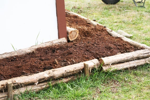 Preparing the garden bed for strawberries.