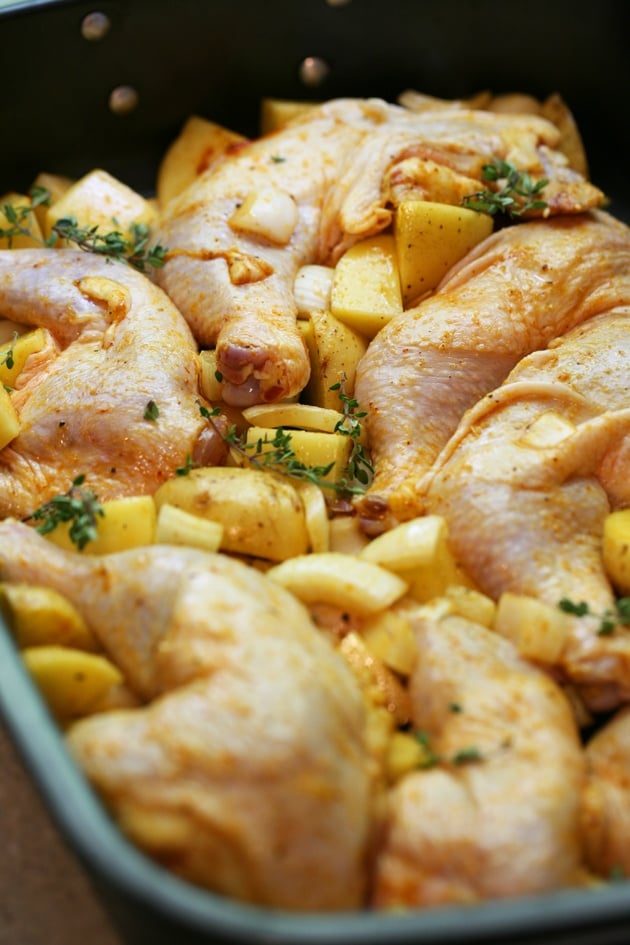 Super easy roasted chicken with potatoes and onions. It takes just a couple of minutes to put this together! 