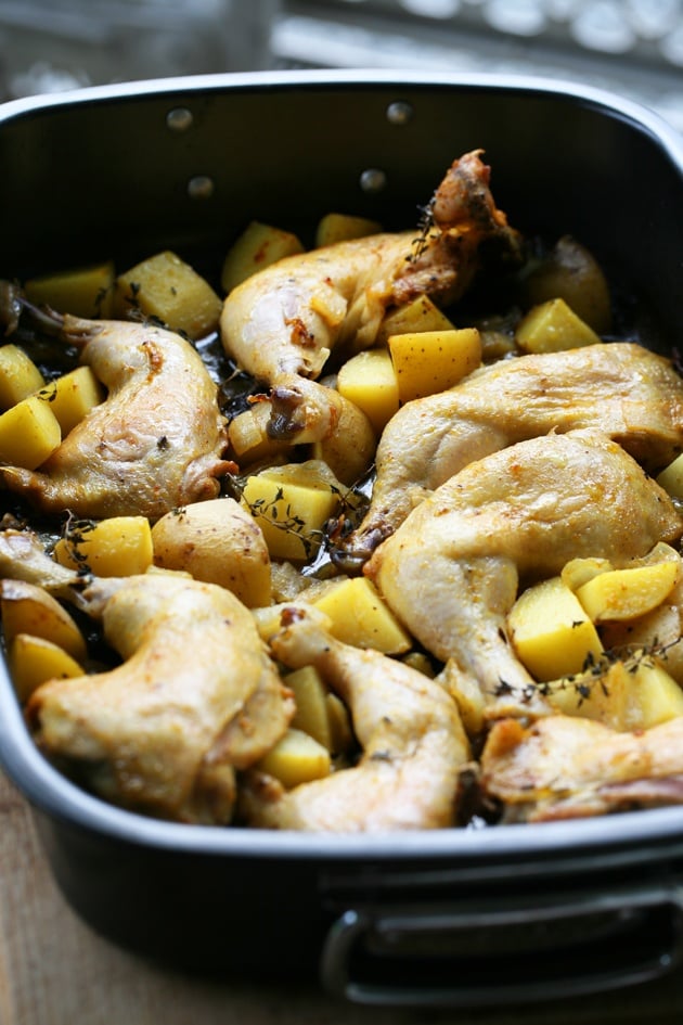 Super easy roasted chicken with potatoes and onions. It takes just a couple of minutes to put this together! 