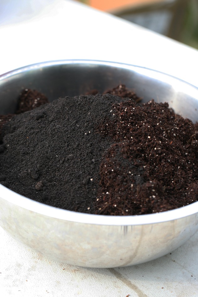 Mixing seed starting soil.
