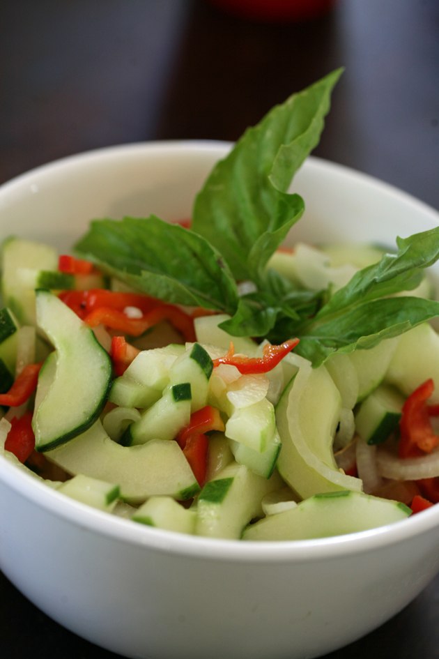 A simple, healthy, and tasty cucumber salad with peppers and sweet onions. All of the vegetables came from the garden so I go over the varieties as well. 