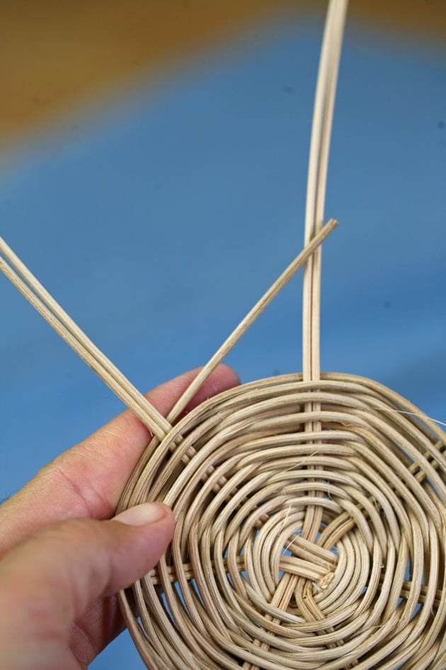 Starting to band a handmade basket.