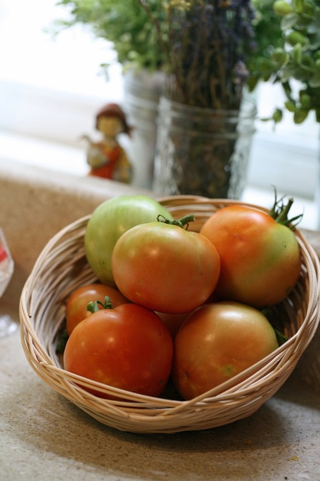 Tomatoes in a handmade reed basket 