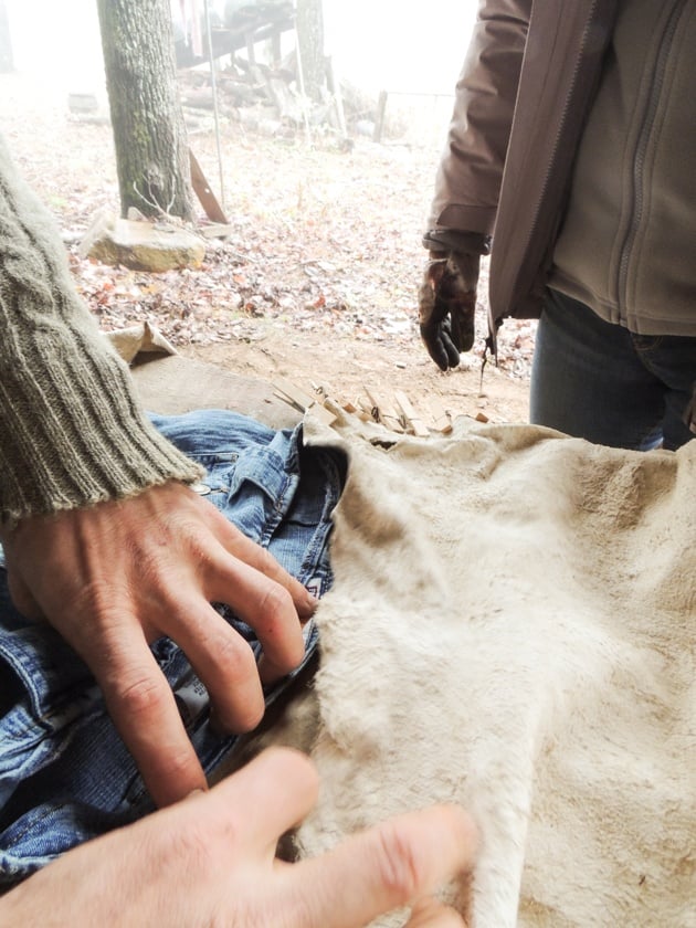 Connecting a skirt to the opening on the two hides. 