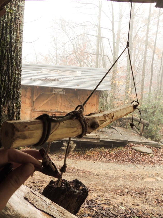 Hanging the hide above the smoking bucket. 