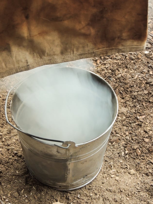 The smoking bucket under the hides. 