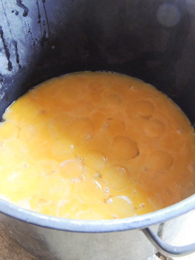 Scrambling the egg yolks. 