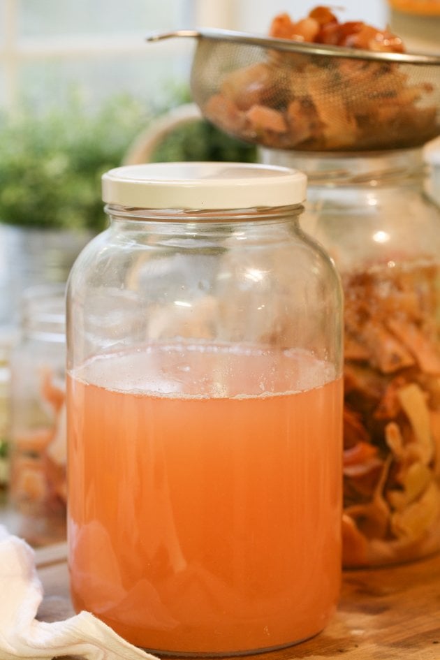 A jar of ready to use apple scrap vinegar.