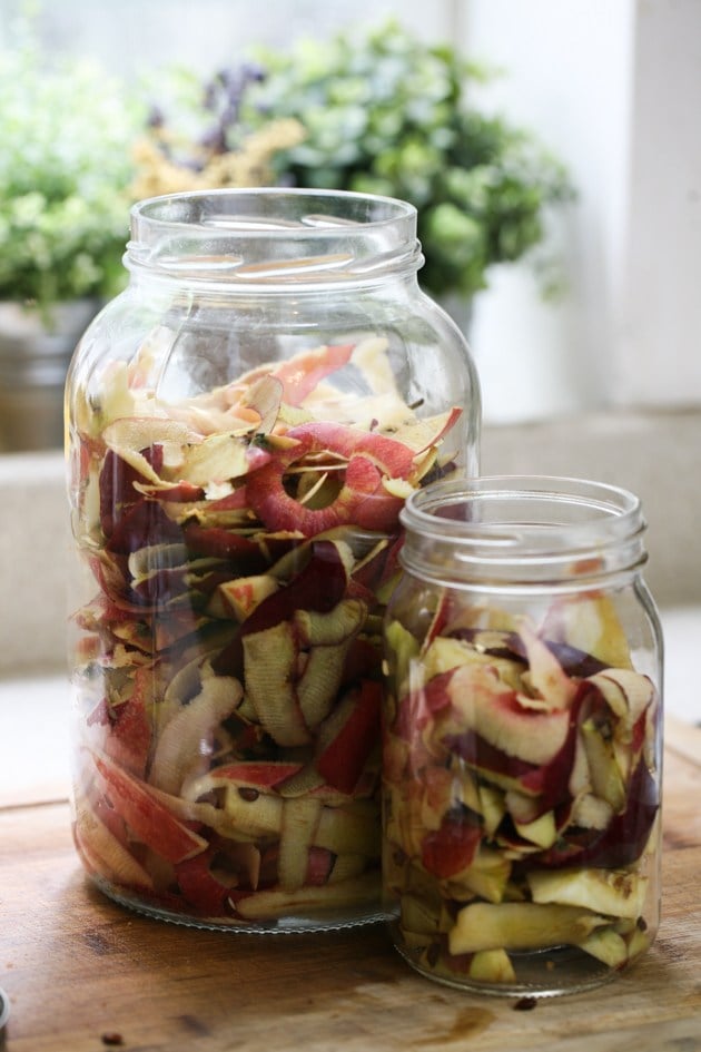 Filling the jar with apple scraps. 