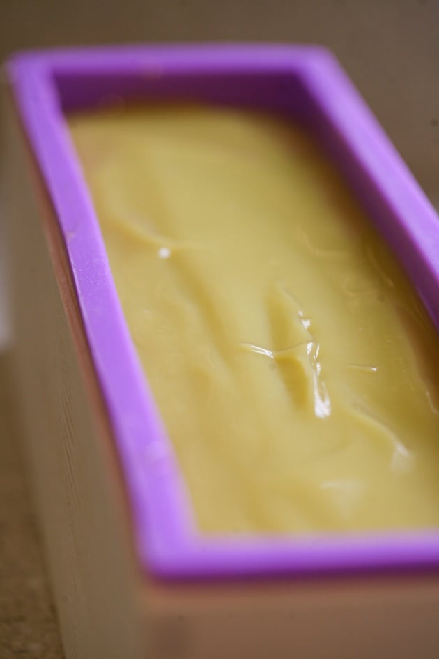 Transferring the soap batter to the mold. 