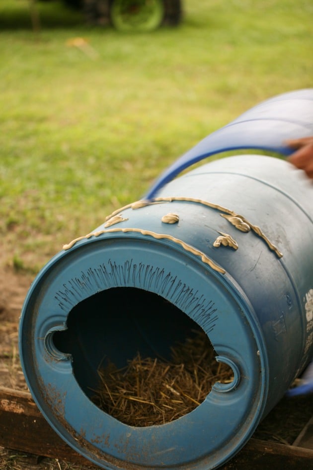 Using glue to attach the roof of the dog house.