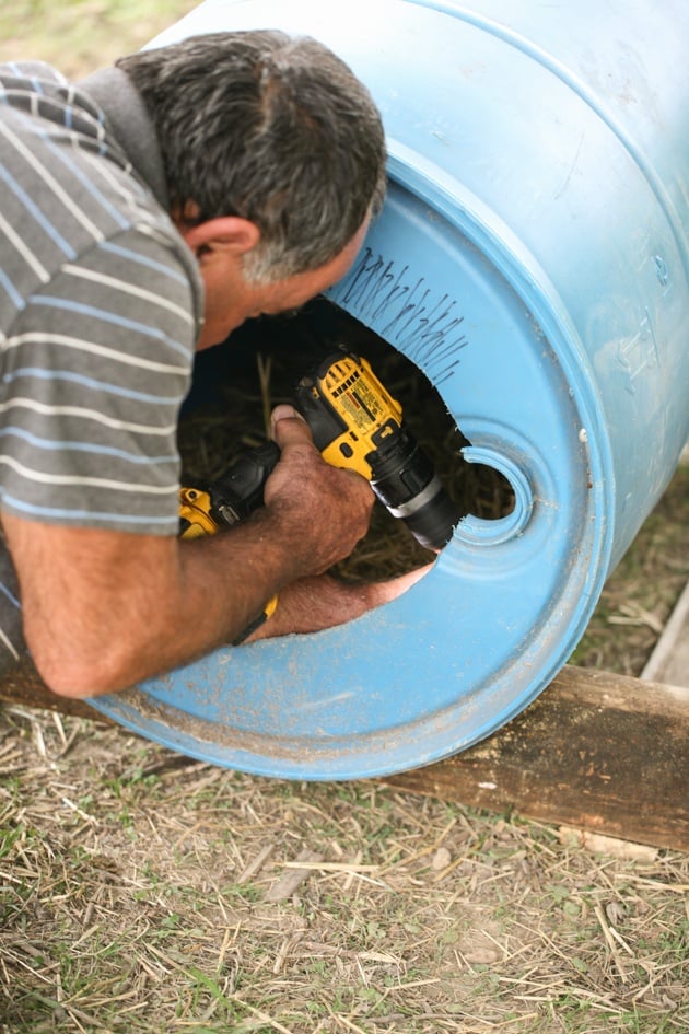 Attaching the dog house to the base.