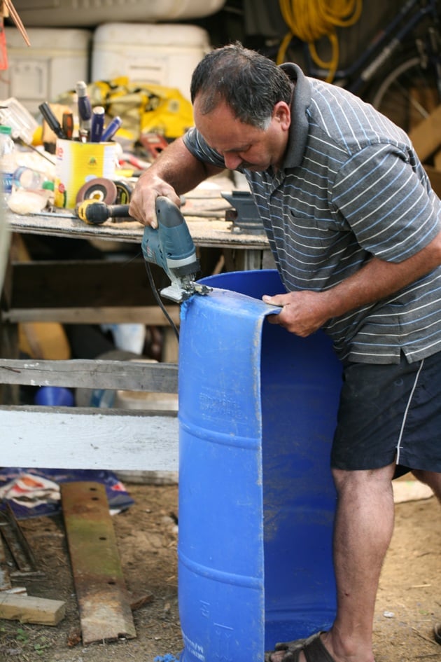 Making a roof for the barrel dog house. 