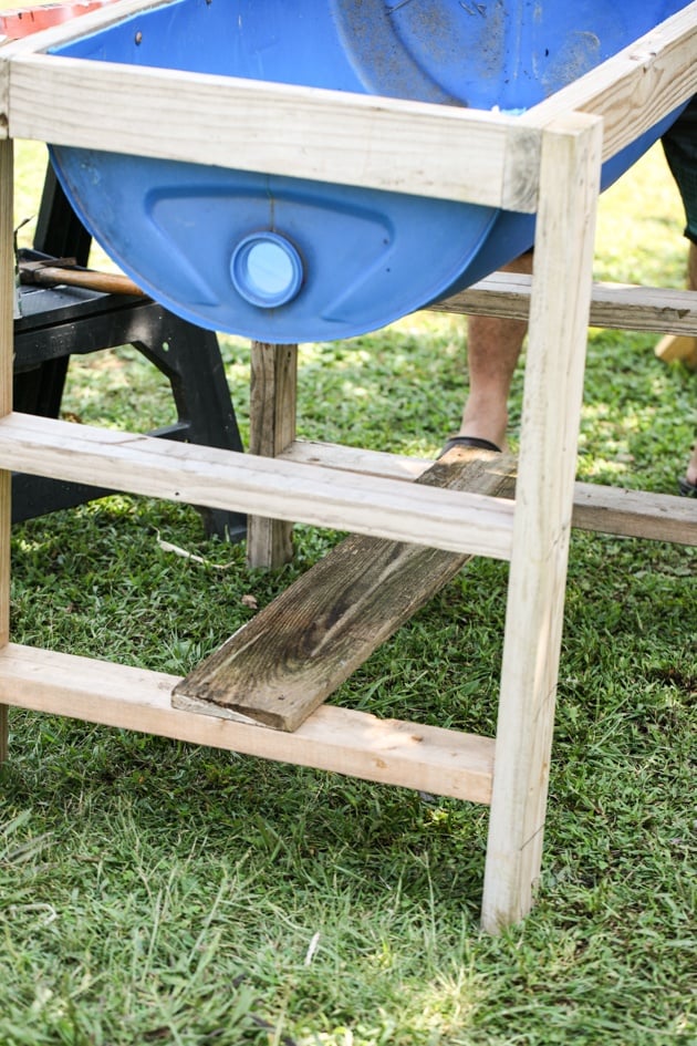 DIY top bar hive from a barrel. A step by step picture tutorial on how we made our top bar bee hive. It is a fairly easy project and very inexpensive. Can be completed in just a few hours. 