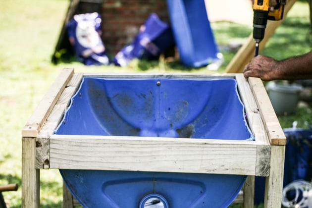 DIY top bar hive from a barrel. A step by step picture tutorial on how we made our top bar bee hive. It is a fairly easy project and very inexpensive. Can be completed in just a few hours. 