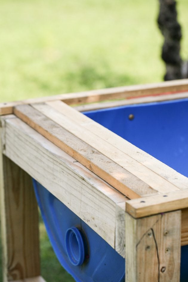 DIY top bar hive from a barrel. A step by step picture tutorial on how we made our top bar bee hive. It is a fairly easy project and very inexpensive. Can be completed in just a few hours. 