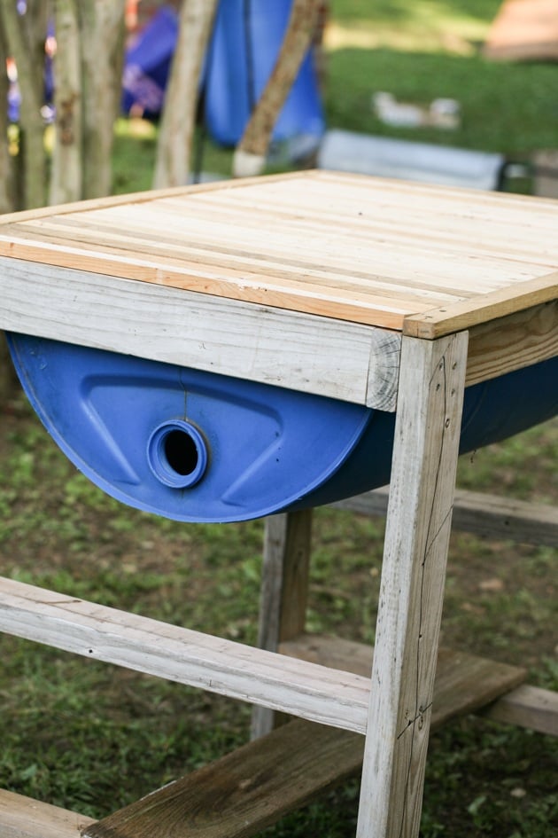 DIY top bar hive from a barrel. A step by step picture tutorial on how we made our top bar bee hive. It is a fairly easy project and very inexpensive. Can be completed in just a few hours. 