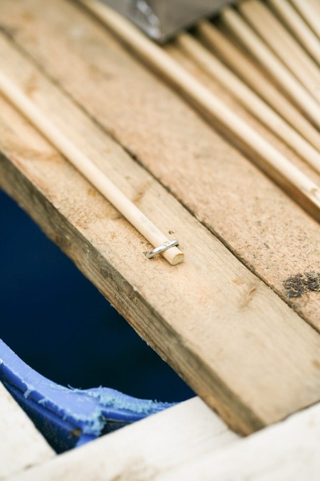 DIY top bar hive from a barrel. A step by step picture tutorial on how we made our top bar bee hive. It is a fairly easy project and very inexpensive. Can be completed in just a few hours. 