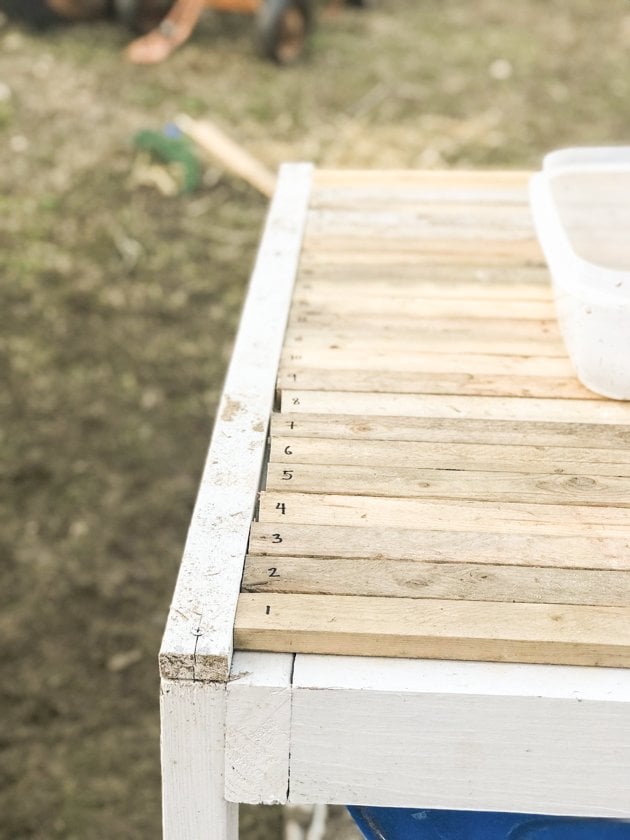 DIY top bar hive from a barrel. A step by step picture tutorial on how we made our top bar bee hive. It is a fairly easy project and very inexpensive. Can be completed in just a few hours. 