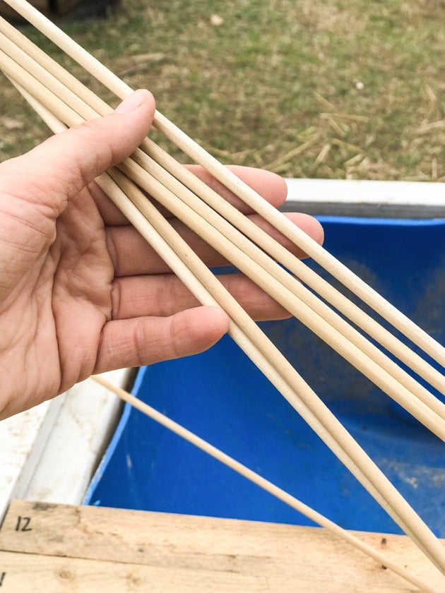 DIY top bar hive from a barrel. A step by step picture tutorial on how we made our top bar bee hive. It is a fairly easy project and very inexpensive. Can be completed in just a few hours. 