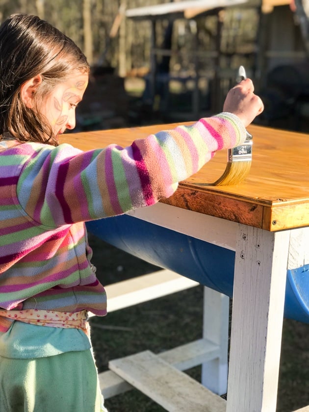 DIY top bar hive from a barrel. A step by step picture tutorial on how we made our top bar bee hive. It is a fairly easy project and very inexpensive. Can be completed in just a few hours. 