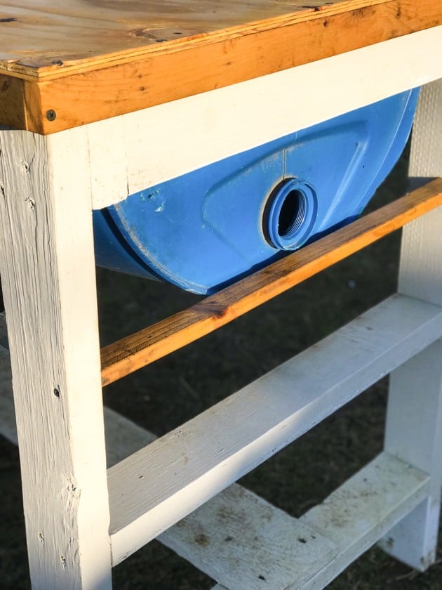 DIY top bar hive from a barrel. A step by step picture tutorial on how we made our top bar bee hive. It is a fairly easy project and very inexpensive. Can be completed in just a few hours. 