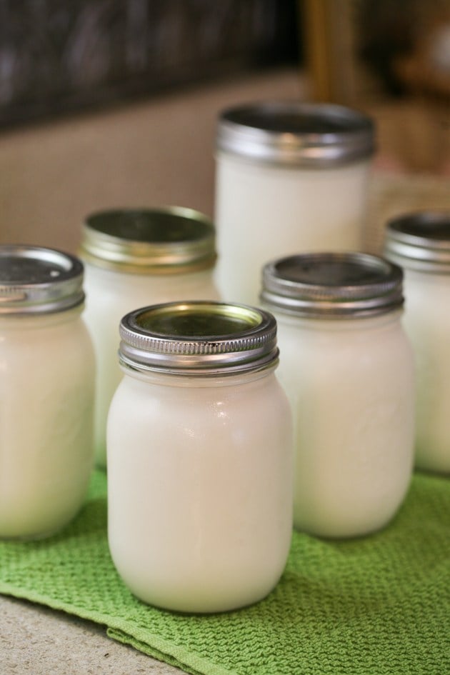 Jars of cold milk from the fridge. 