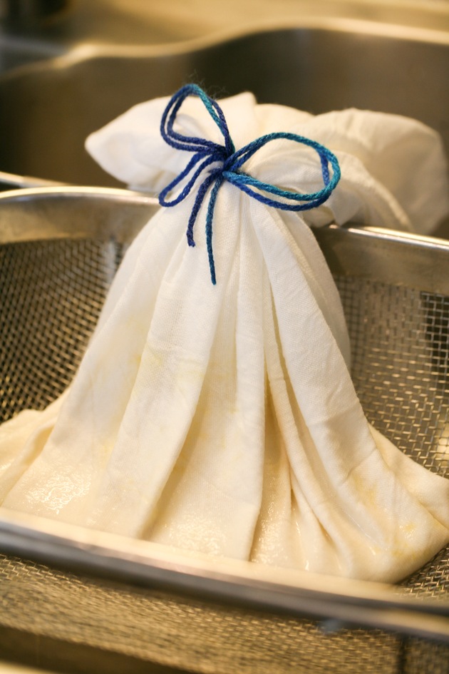 Tying the cheesecloth.