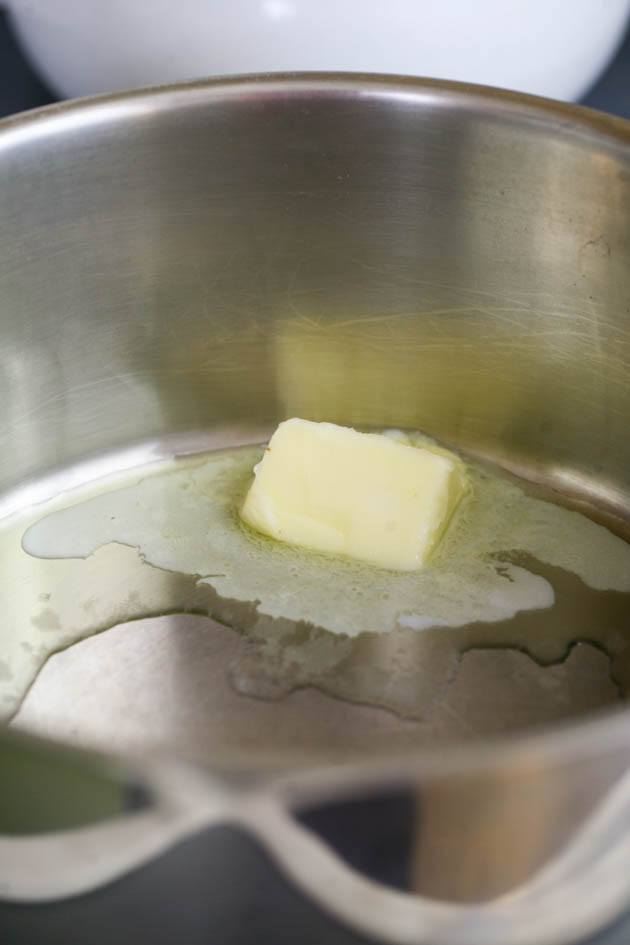 Melting butter in the pot.