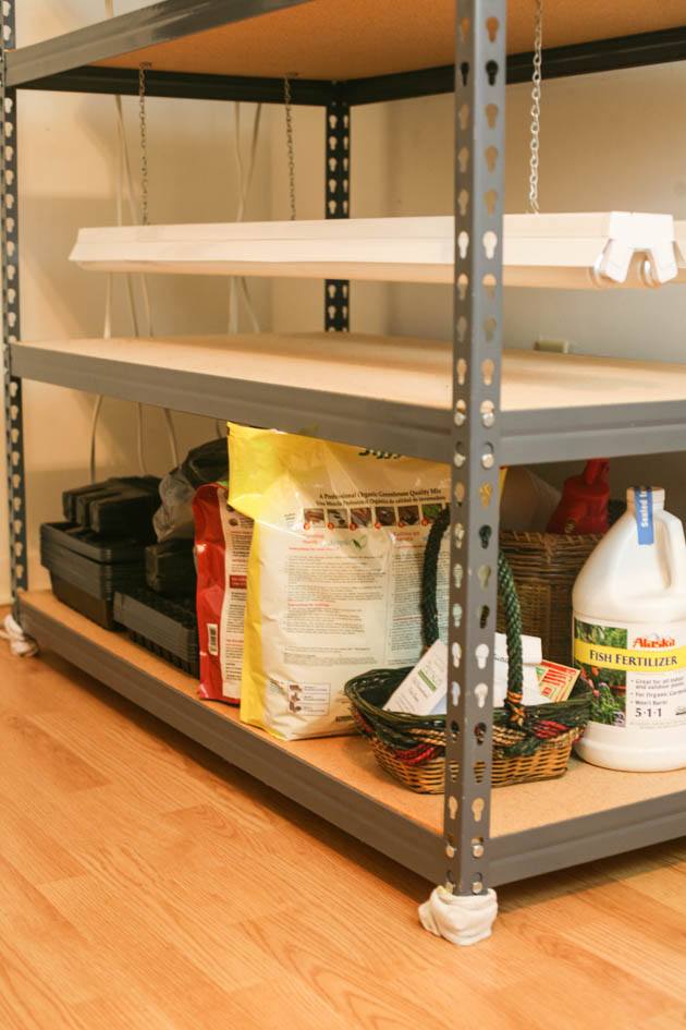 Using the bottom shelf to store seed starting supply. 