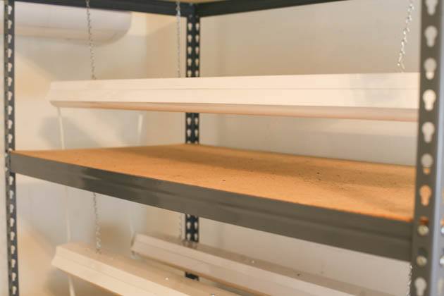 The shelves of the DIY grow light stand. 