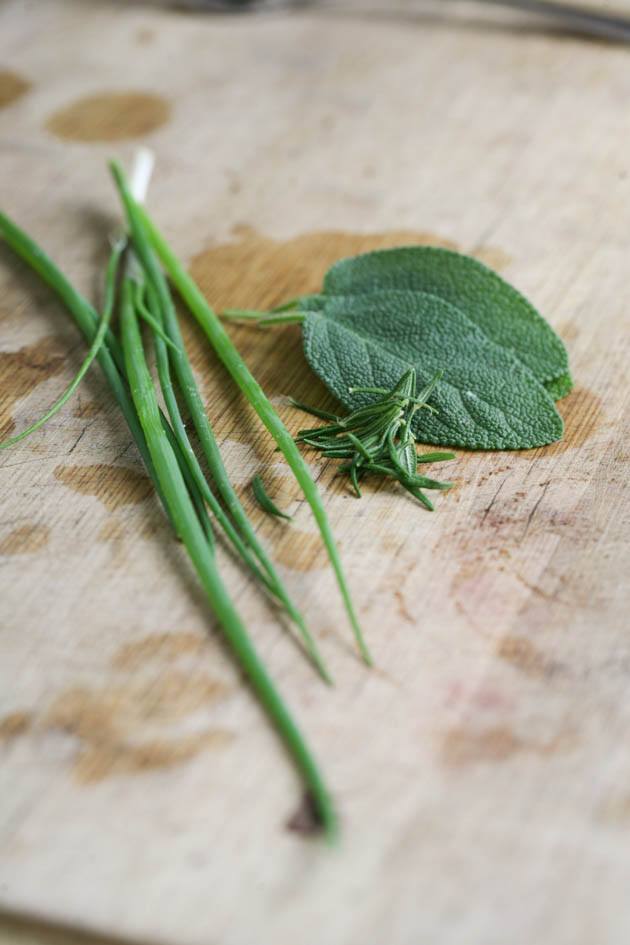 Green onion, rosemary, and sage to season the potato. 