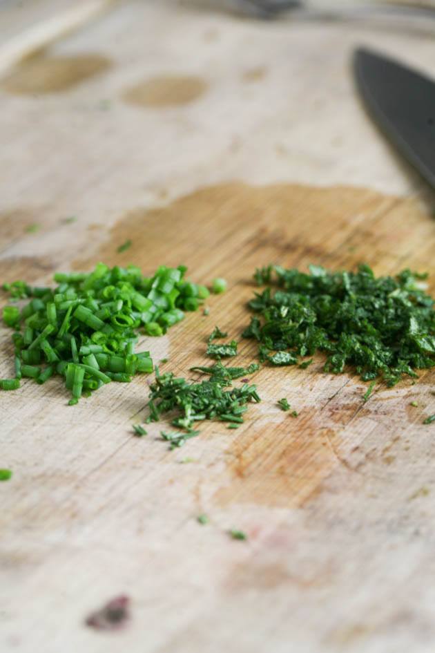 Chopping the greens.