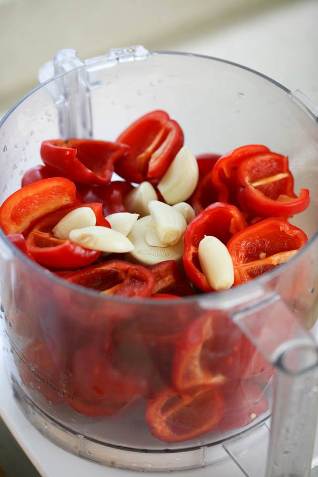 Clean red peppers and garlic in the food processor