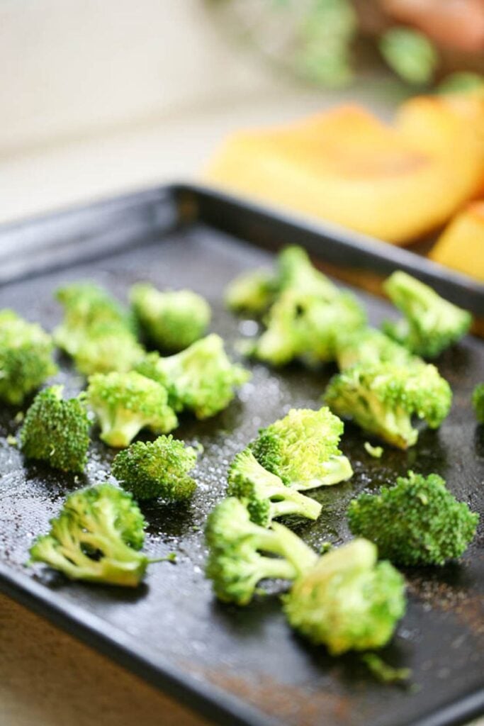 broccoli in one layer on the baking sheet