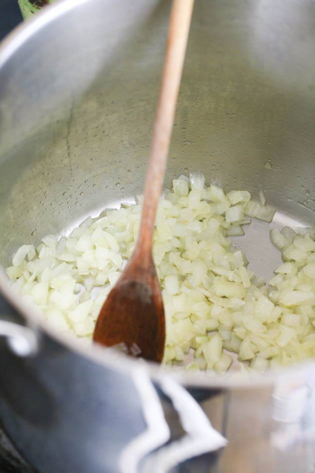 Frying diced onions.