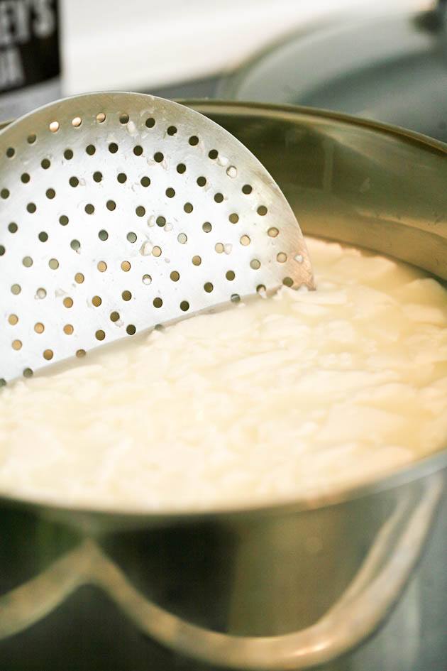 Heating the curds.