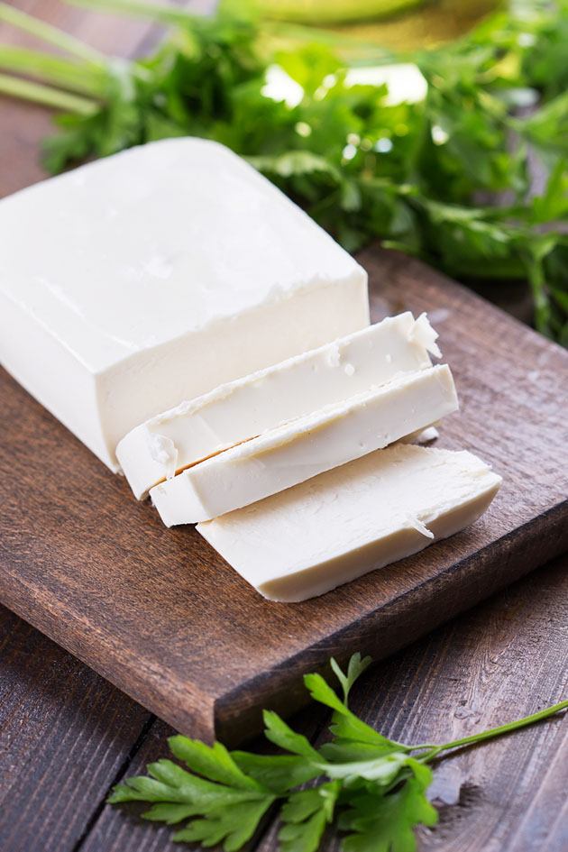 Sliced Feta cheese.