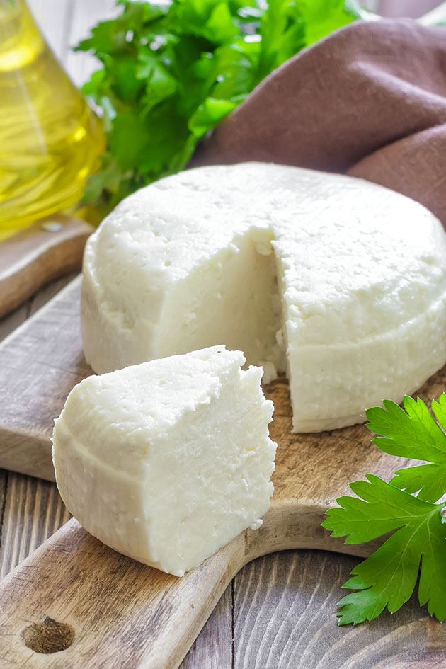 Sliced white cheese - cheesemaking equipment. 