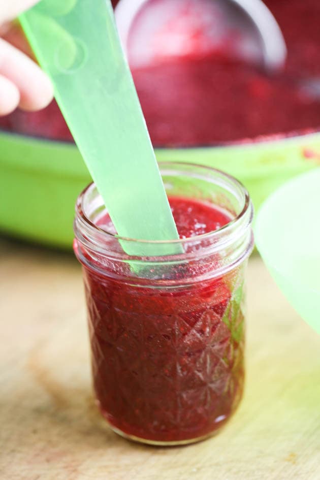 Removing air bubbles from the jar. 