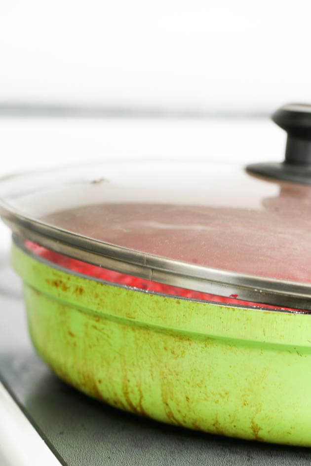 Cooking with the pot half covered. 