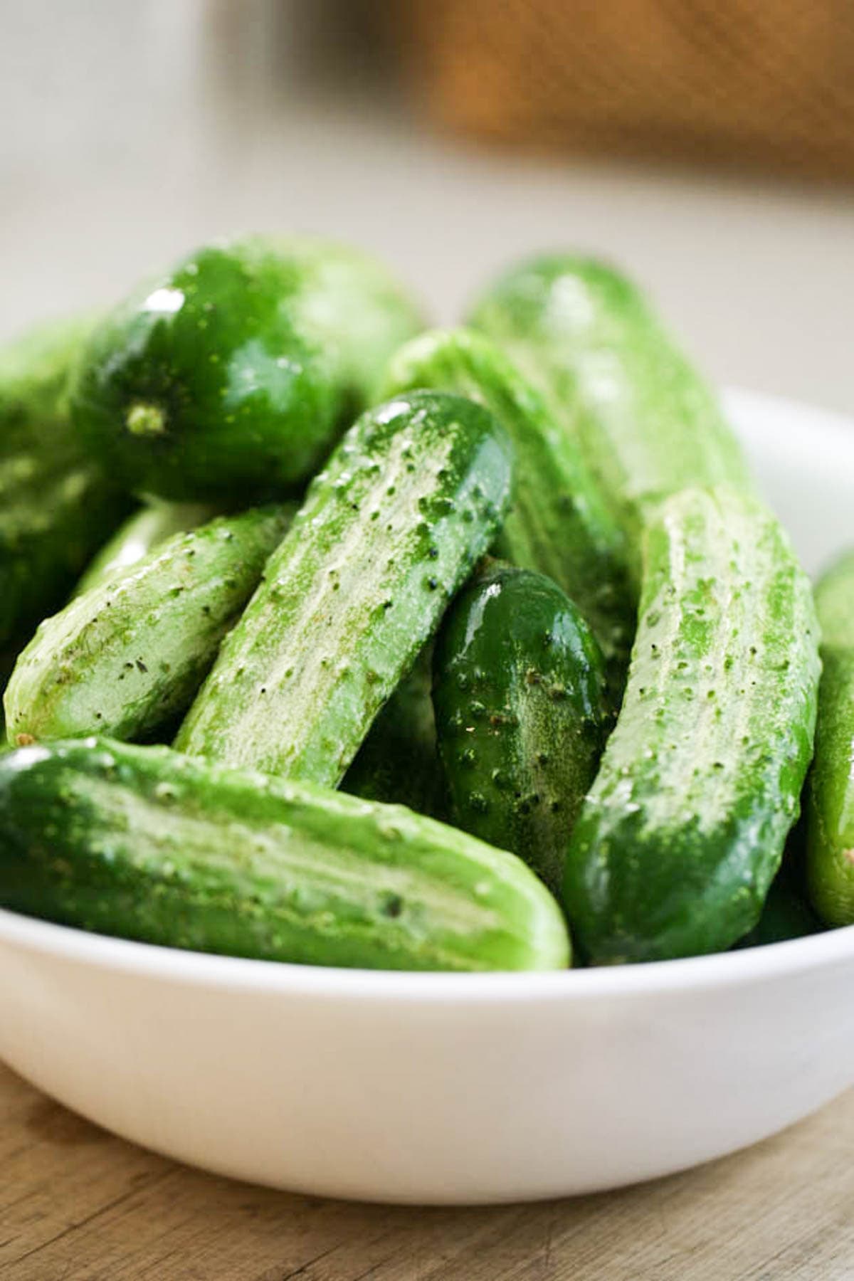 A bowl of pickling cucumbers.