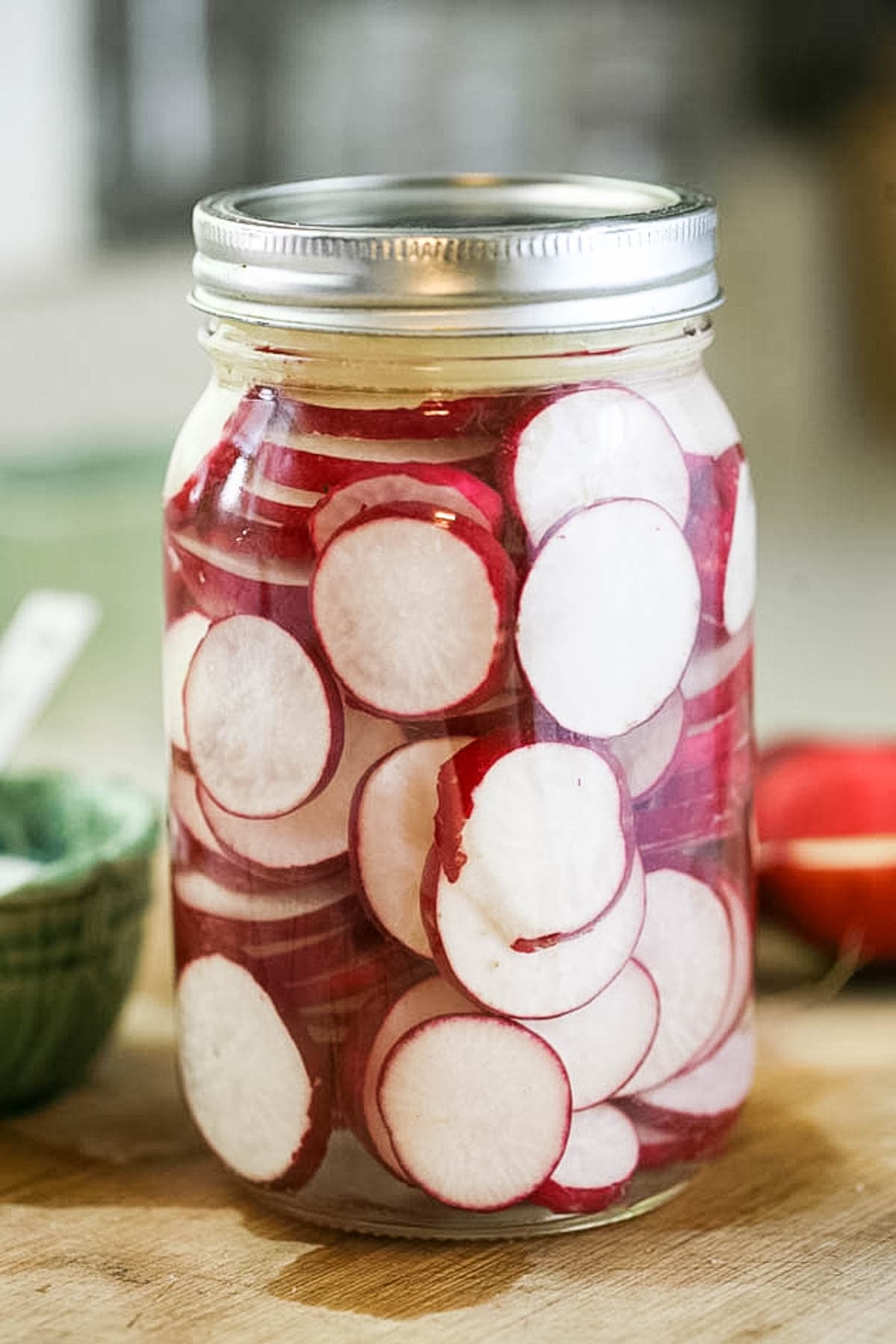 Fermented radish is an easy way to preserve radishes. It takes minutes to put together and the end result is a delicious and healthy snack for the whole family. Lacto fermented radish is not as sharp as raw radish so even the kids love it! 