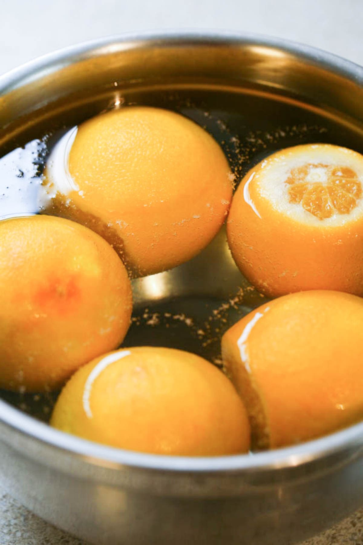 oranges soaking in water